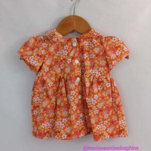 Robe orange motif floral