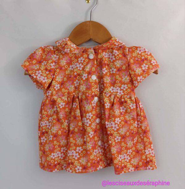 Robe orange motif floral