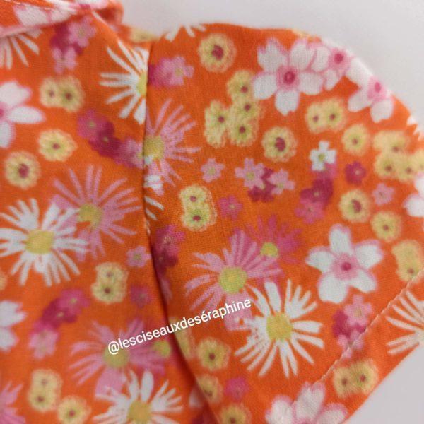 Robe orange motif floral