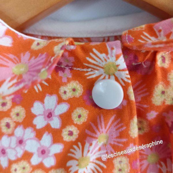 Robe orange motif floral