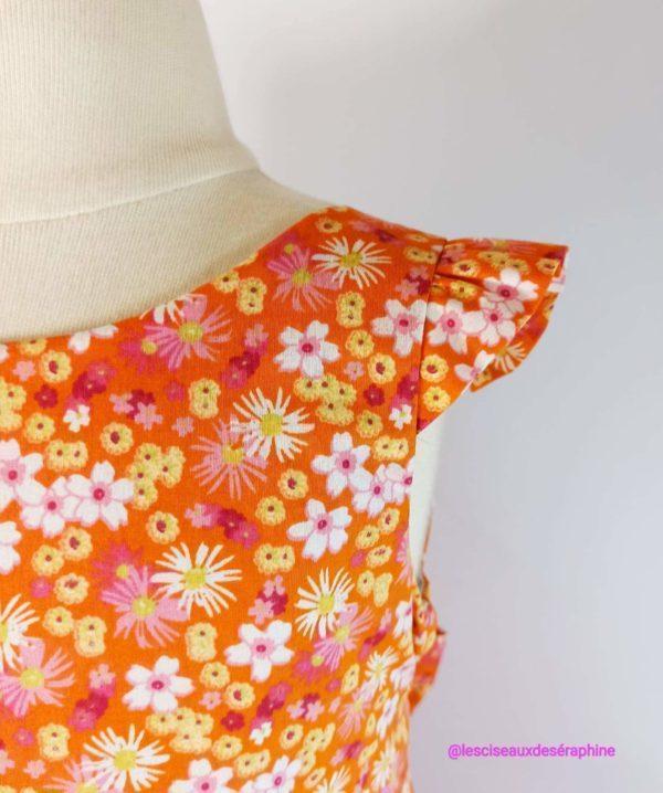 Robe orange motif floral